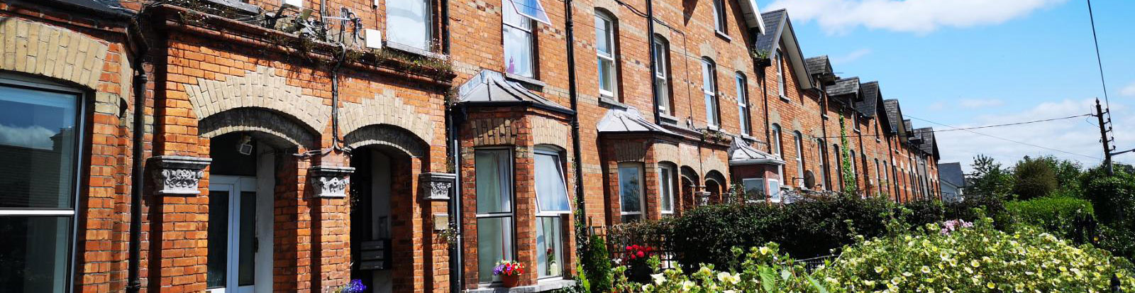 Cork city street with red brick houses